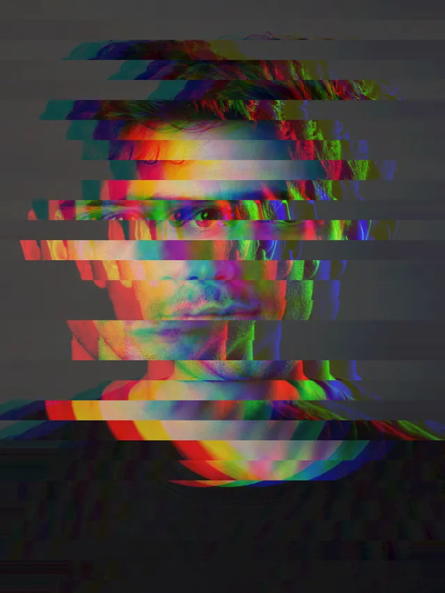 An exaggerated glitch portrait with wide colored duplicates and many displaced bands breaking the alignment of the eyes, nose, mouth, and neck.